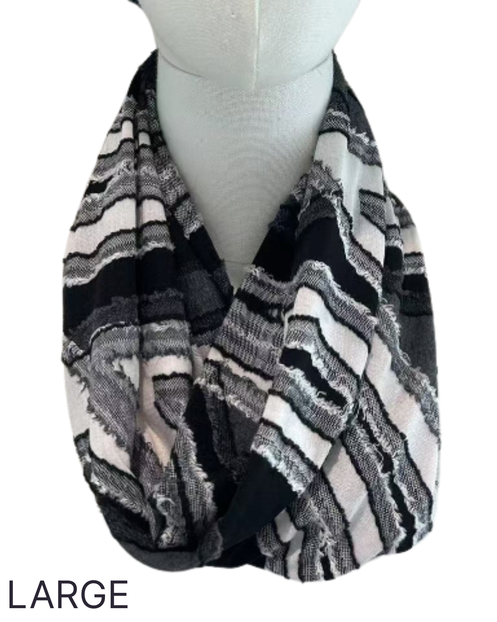 Patterned scarf on a mannequin with 'LARGE' label